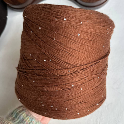 Бобина Kachinelli Merino (85% меринос, 4% хлопок, 11% пайетки), 300 м. (1125, Золотой викун)