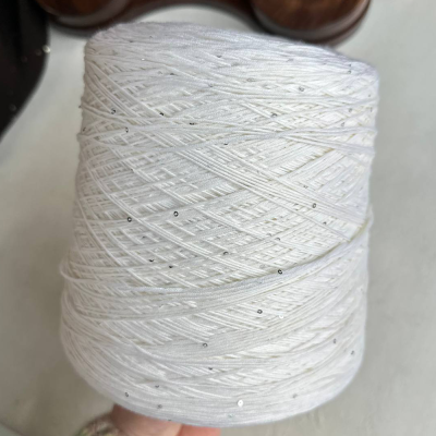 Бобина Kachinelli Merino (85% меринос, 4% хлопок, 11% пайетки), 300 м. (1102, Кокосовый крем)