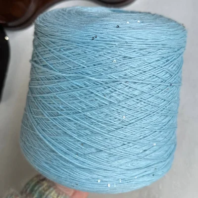 Бобина Kachinelli Merino (85% меринос, 4% хлопок, 11% пайетки), 310 м. (1109, Небо)