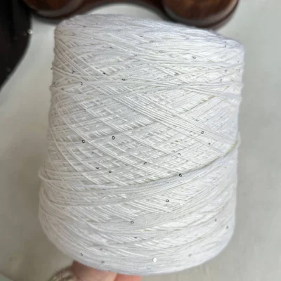 Бобина Kachinelli Merino (85% меринос, 4% хлопок, 11% пайетки), 310 м. (1102, Кокосовый крем)