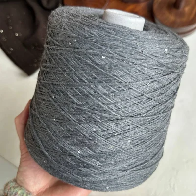 Бобина Kachinelli Merino (85% меринос, 4% хлопок, 11% пайетки), 310 м. (1182, Голубиный подпушек)