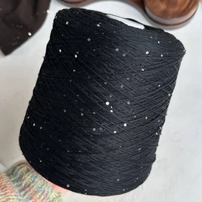 Бобина Kachinelli Merino (85% меринос, 4% хлопок, 11% пайетки), 310 м. (1184, Угольный)