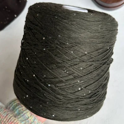 Бобина Kachinelli Merino (85% меринос, 4% хлопок, 11% пайетки), 310 м. (1112, Софт Грин)