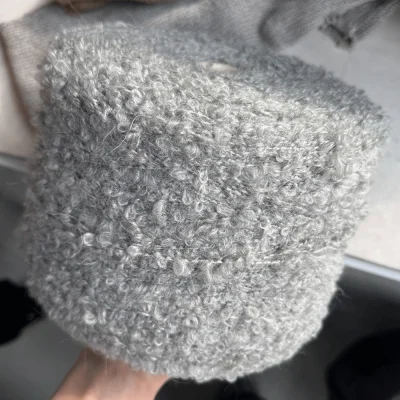 Бобина кудри by New Mill (20% кидмохер, 10% меринос, 57% Пэ, 13% Па), 180 м. (63300, Мех бегемота)