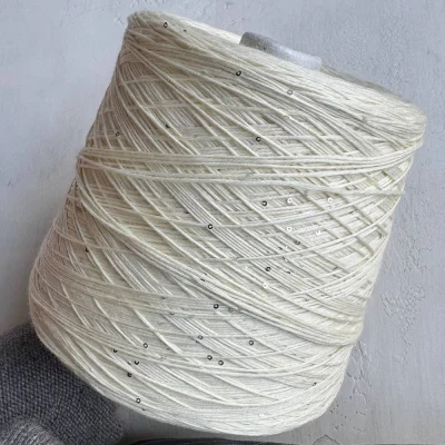 Бобина Kachinelli Merino (85% меринос, 4% хлопок, 11% пайетки), 310 м. (1021, Пломбир)